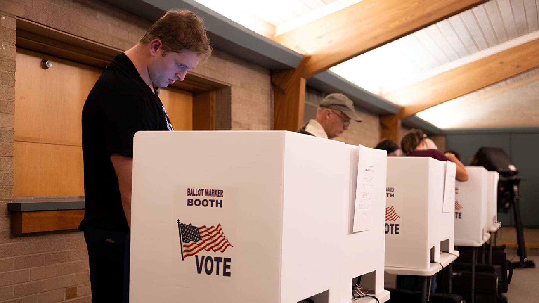 Voters fill out their ballot